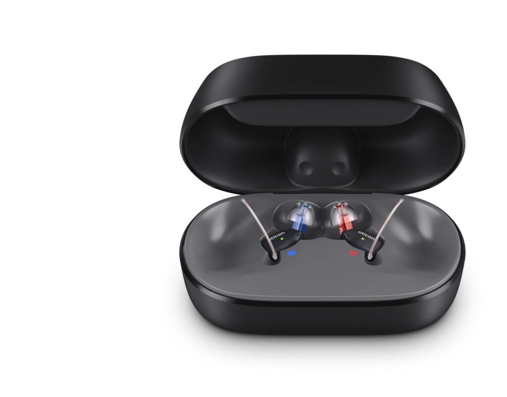 Oticon Zeal nxtCIC hearing aids in charging case
