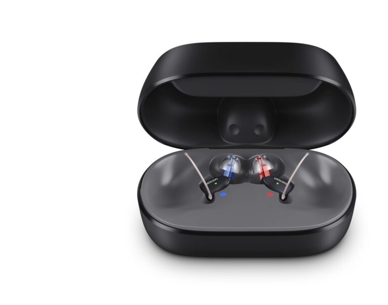 Oticon Zeal nxtCIC hearing aids in charging case